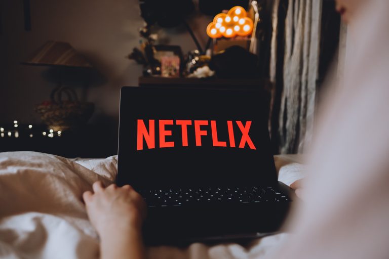 Why is Netflix considering going all-cash for WBD assets?