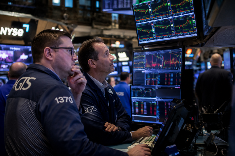 Dow hits record high as AI rally offsets US-Iran tensions on Wall Street